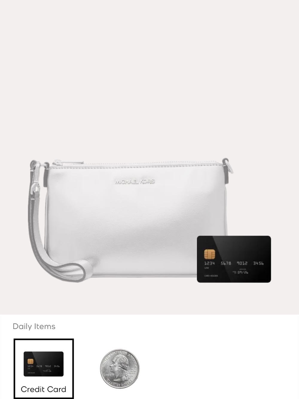 Michael Kors silver Jet set wristlet Pouch. New in the package.
